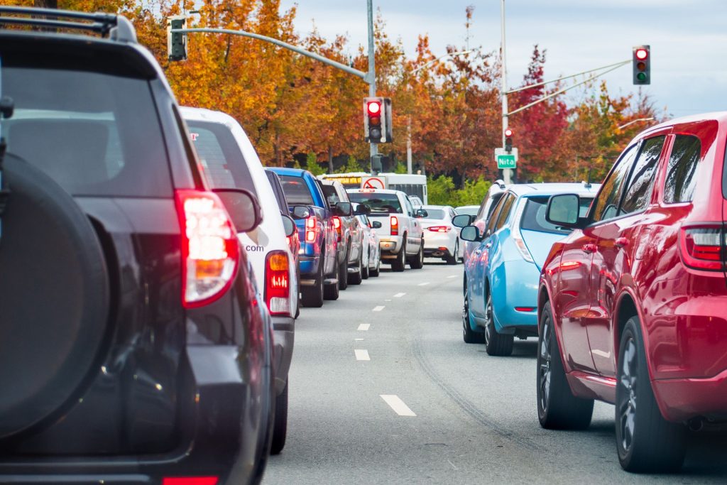 Busy Traffic Waits At Smart Traffic Signal